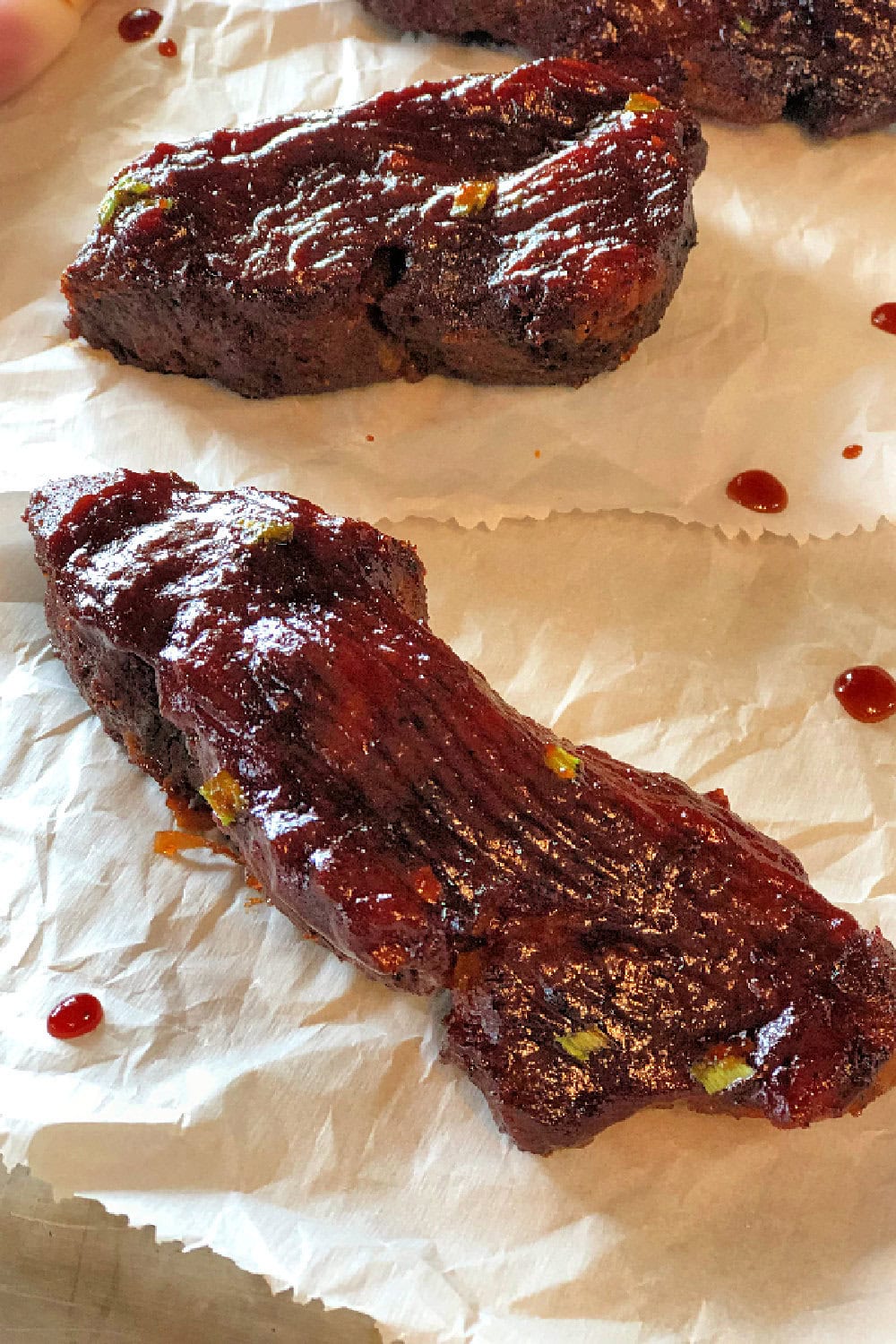 Oven baked country style ribs with three ingredient sticky bbq sauce. 