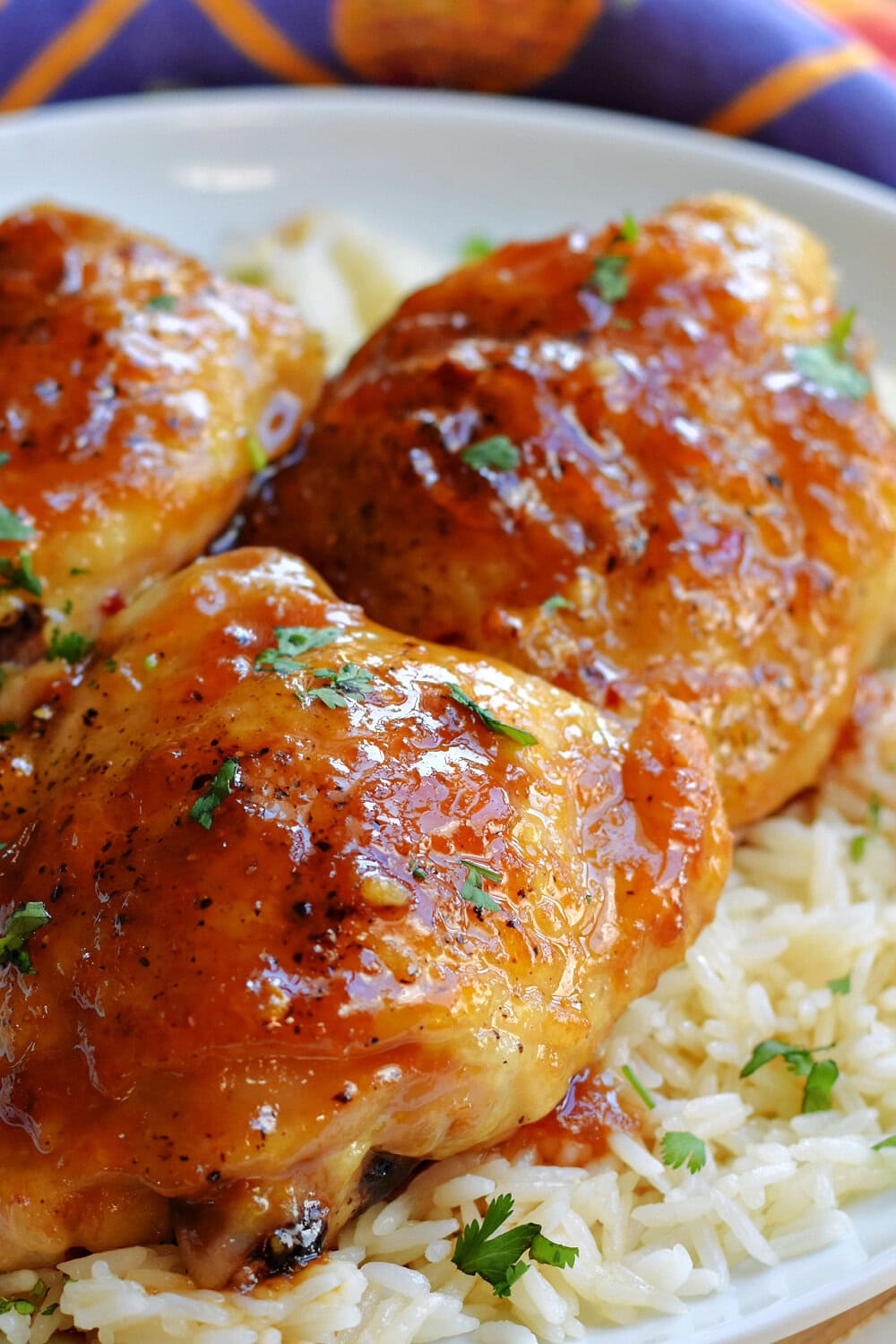 Asian Sticky Chicken Thighs on a bed of warm rice. 