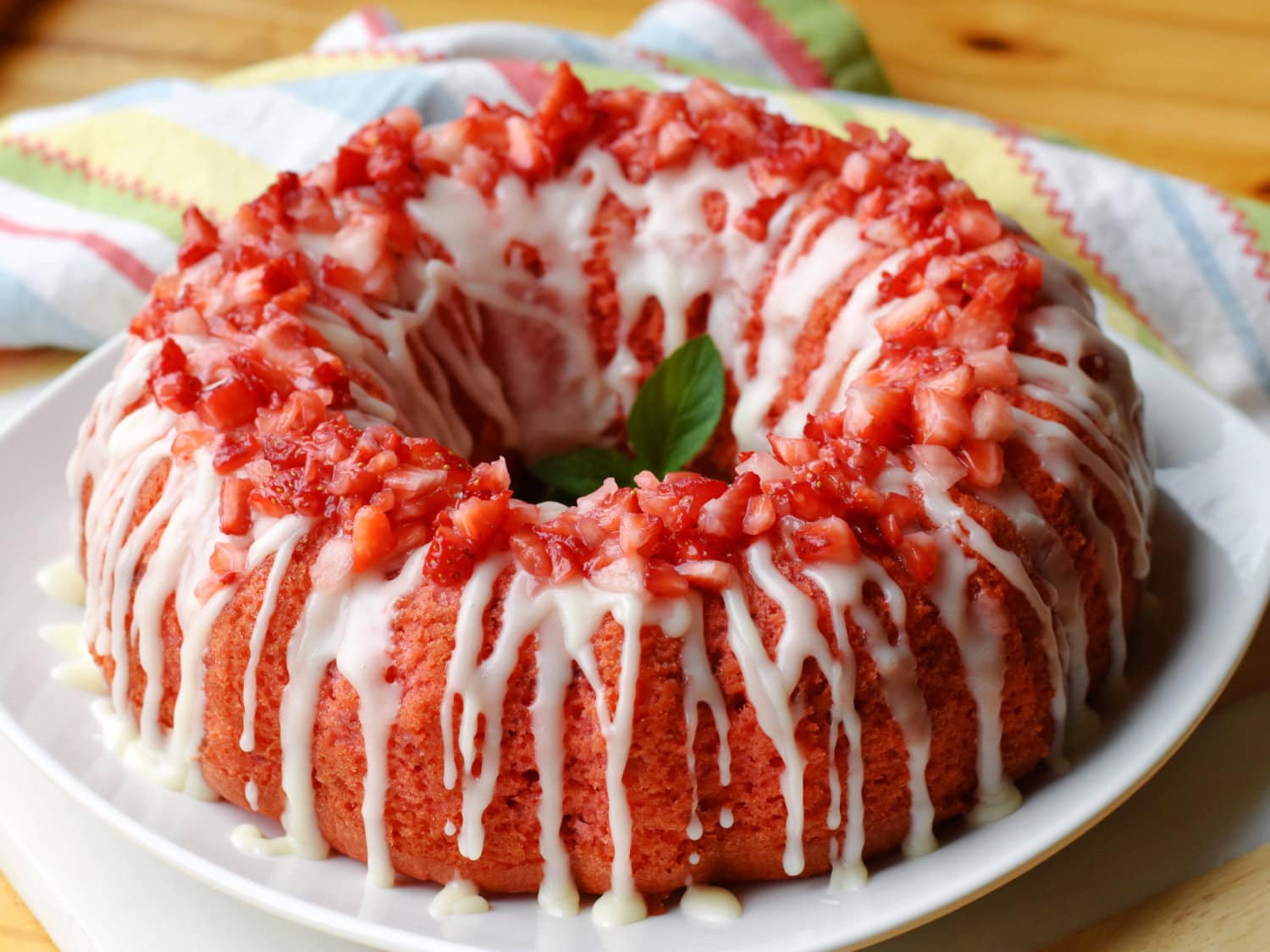 Strawberry Pound Cake on a white platter. 