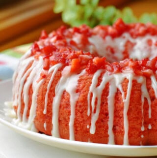 A beautiful Strawberry Pound Cake on a serving platter.