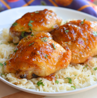 Easy sticky asian chicken thighs over a bed of rice.