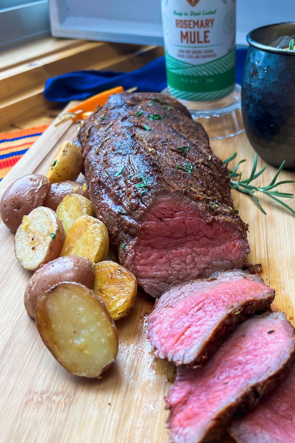 Slices of tri tip steak made in the oven with crispy potatoes. 