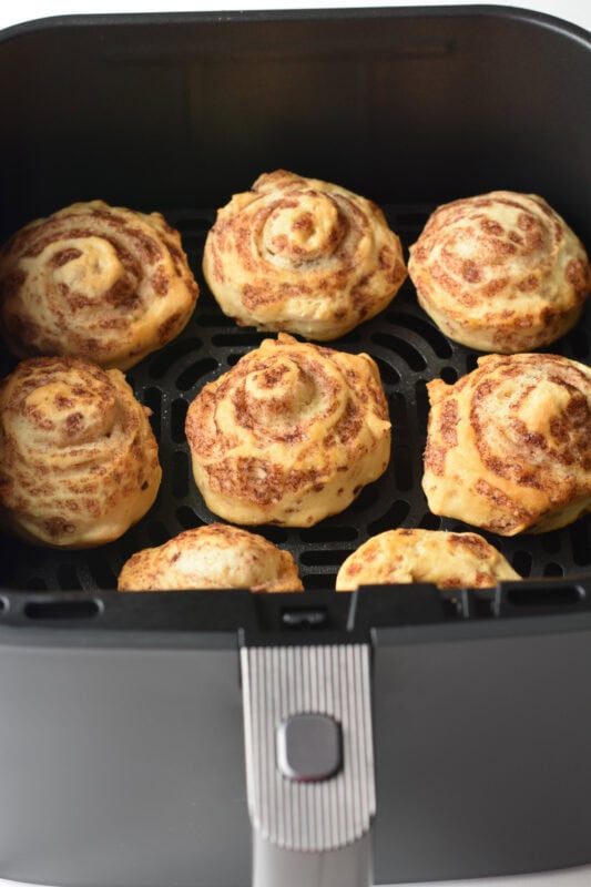 Tender and fluffy Pillsbury cinnamon rolls made in the air fryer.