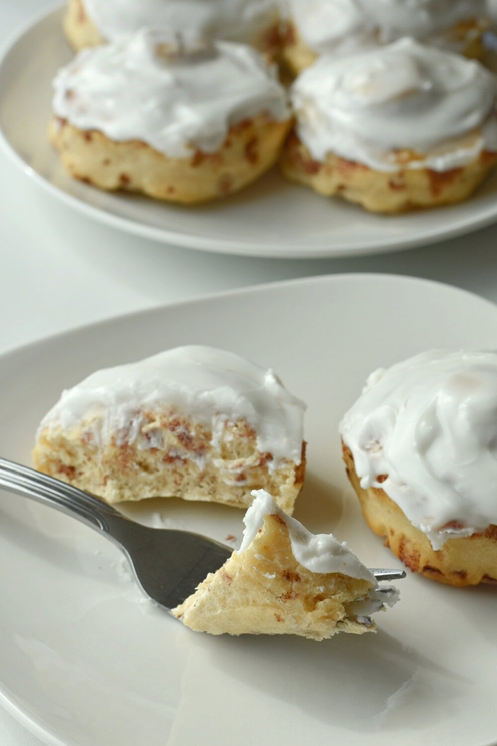 Perfectly cooked and fluffy cinnamon rolls that are frosted. 