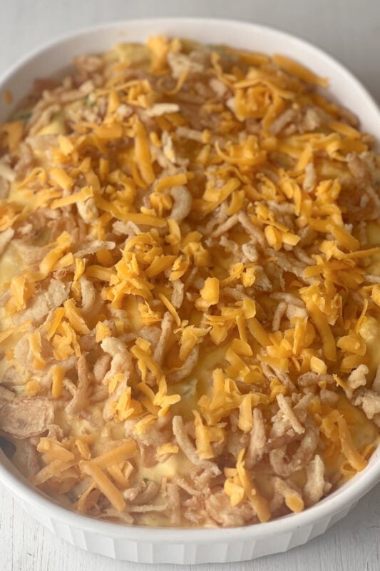 Broccoli Cauliflower Casserole topped with french fried onions and shredded cheese. 