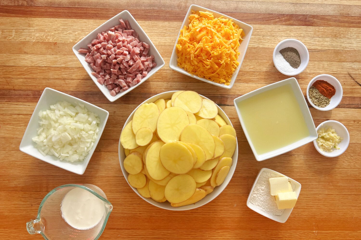 All the ingredients needed to make Ham and Scalloped Potatoes in the Crock Pot. 