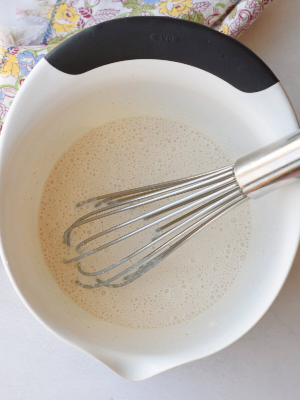 scalloped-sweet-potatoes-cream Cream, brown sugar and melted butter in a mixing bowl.