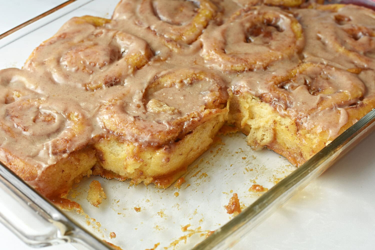 Pumpkin cinnamon rolls made with heavy cream and pumpkin spice. 