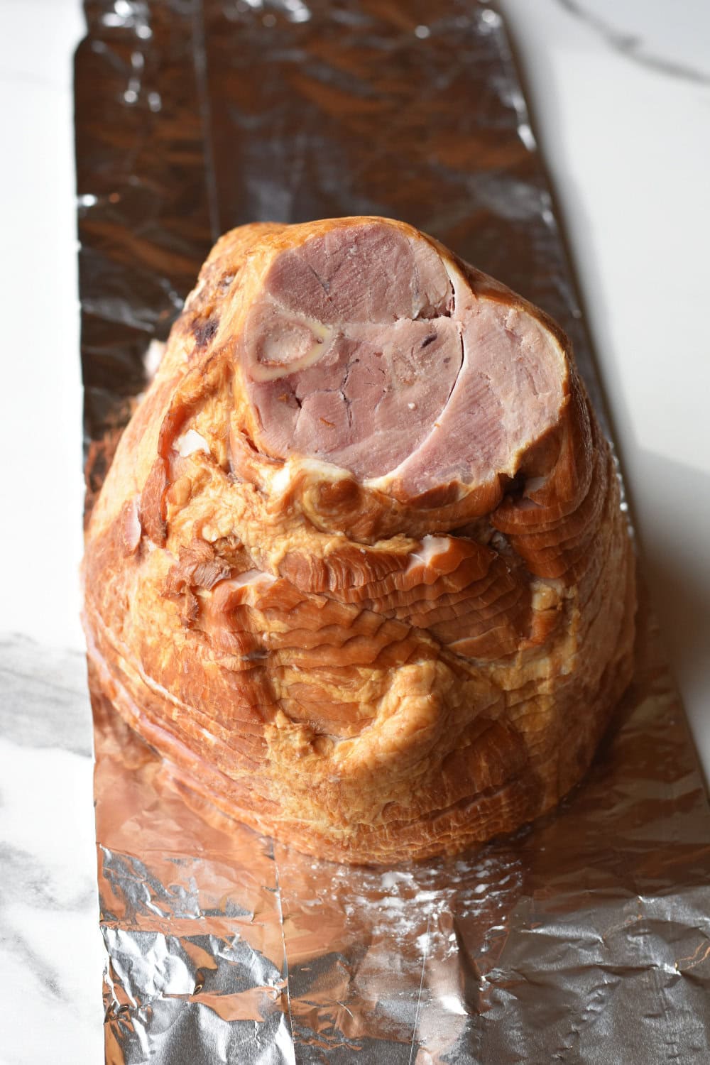 spiral-ham-tin-foil Spiral ham on top of tin foil to create a sling.