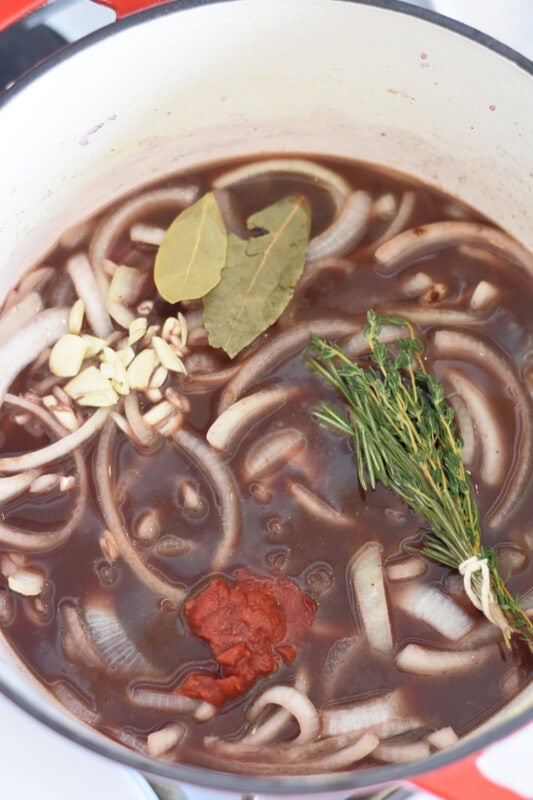 Beef broth with onions, garlic, thyme, rosemary and tomato paste. 