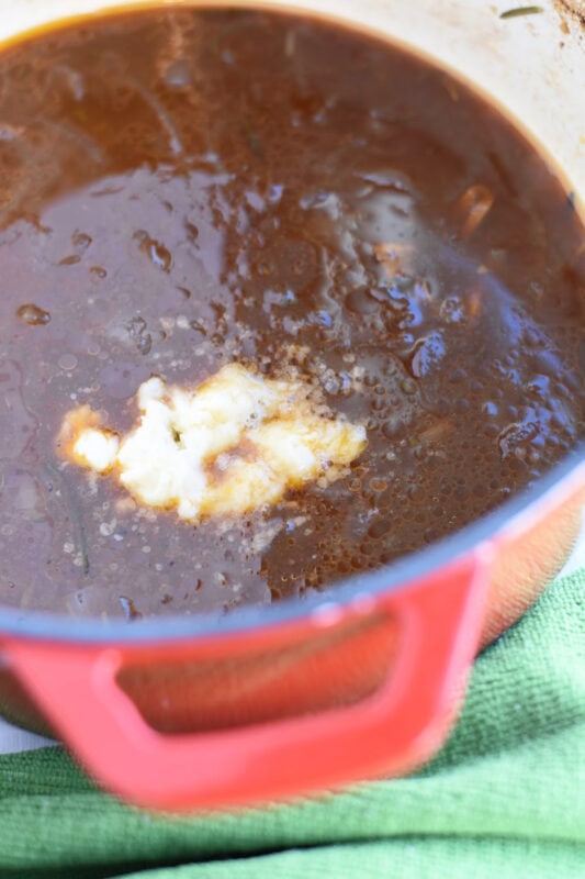 Beef broth with butter and flour paste in it to make gravy. 