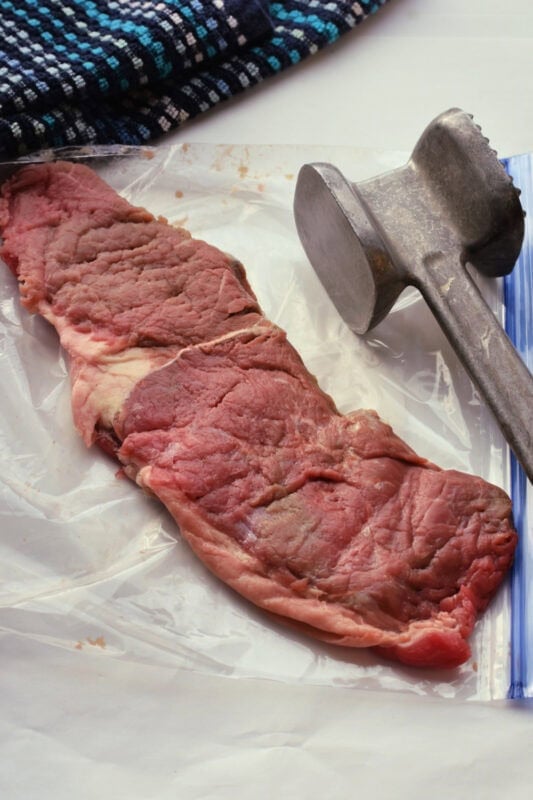 round-steak-mallet Using a mallet on a round steak.
