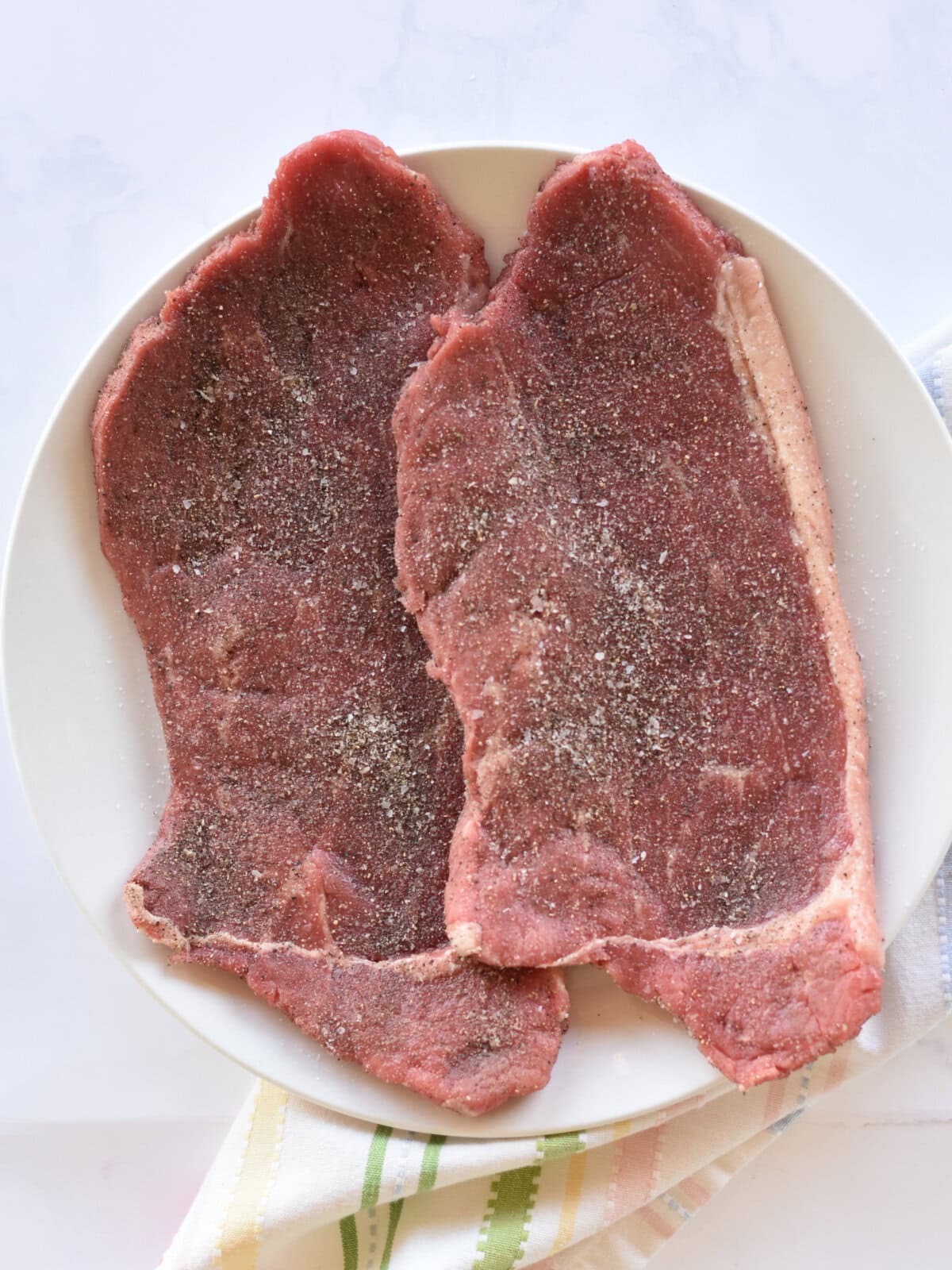 Meat that is seasoned with salt and pepper. 