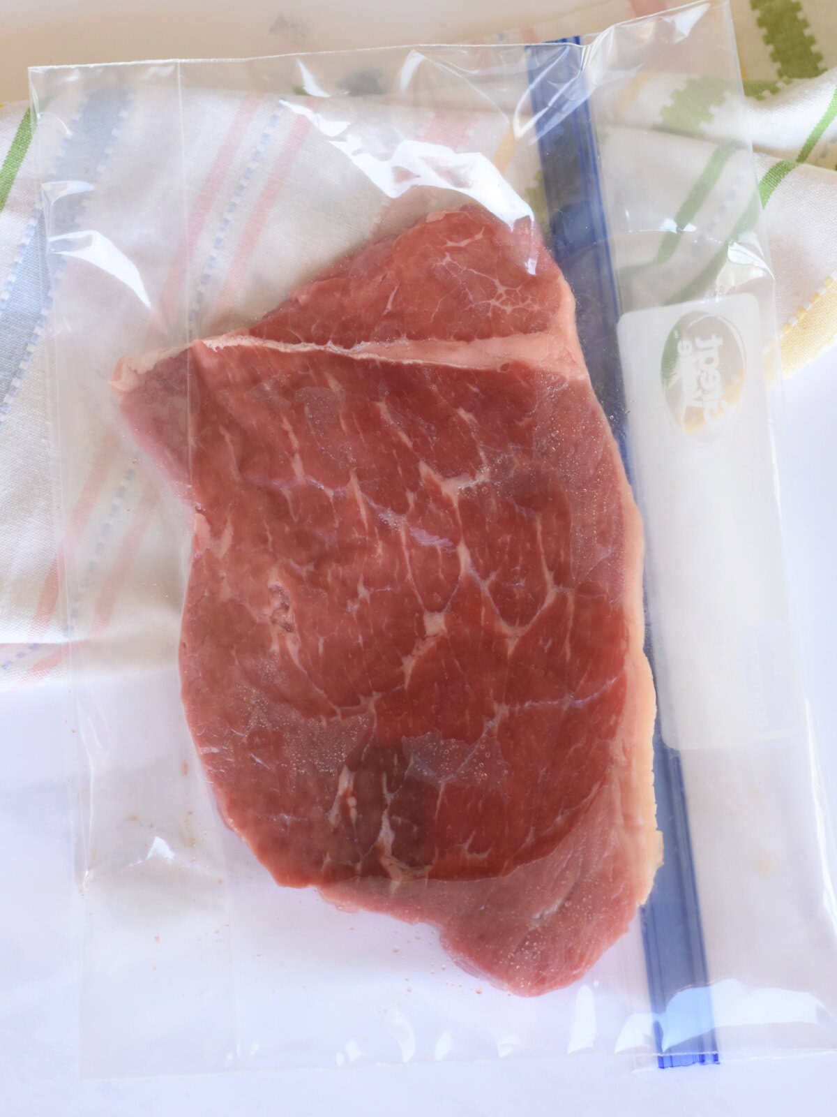 Meat in a gallon freezer bag. 