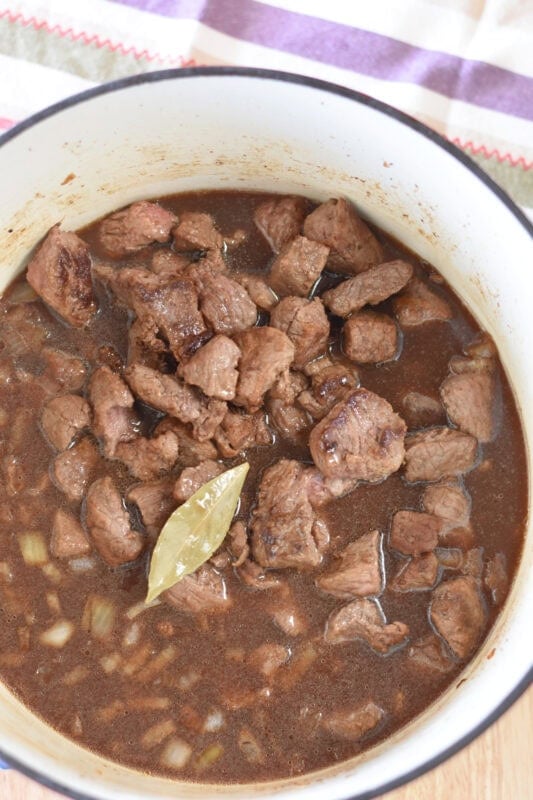 stew-meat-broth Stew meat in beef broth with onions and seasoning.