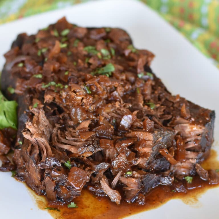 Slow cooker london broil in a sweet and savory gravy.