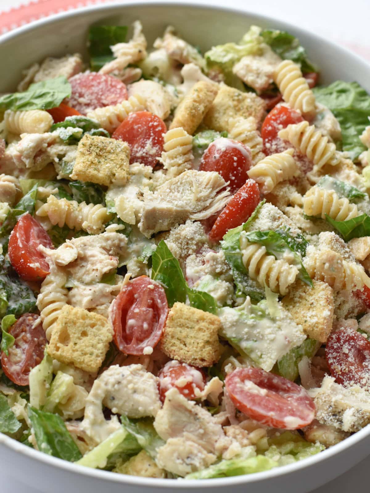 Caesar-Salad-Pasta-Recipe Caesar Salad Pasta tossed in a creamy Italian and Caesar dressing.