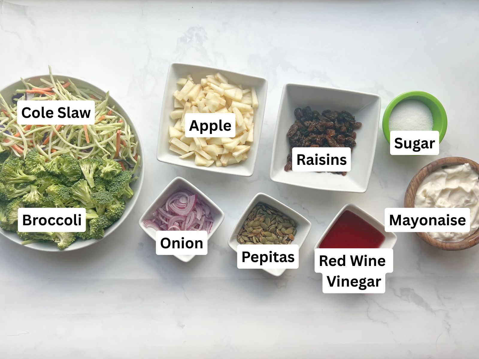 Broccoli Salad with Raisins labeled ingredient picture. 