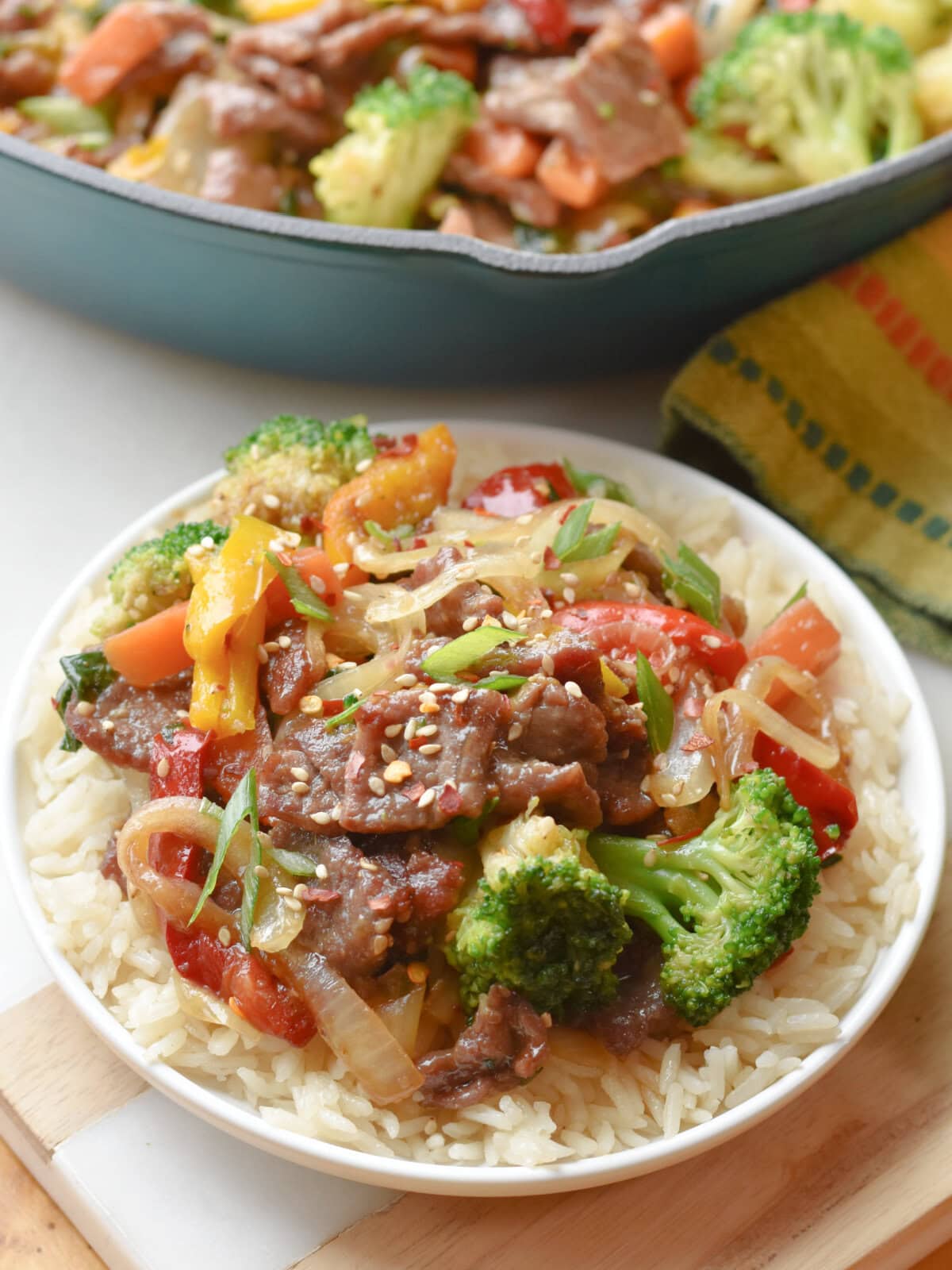 Bottom Round Steak Stir Fry with broccoli over a bed of rice. 