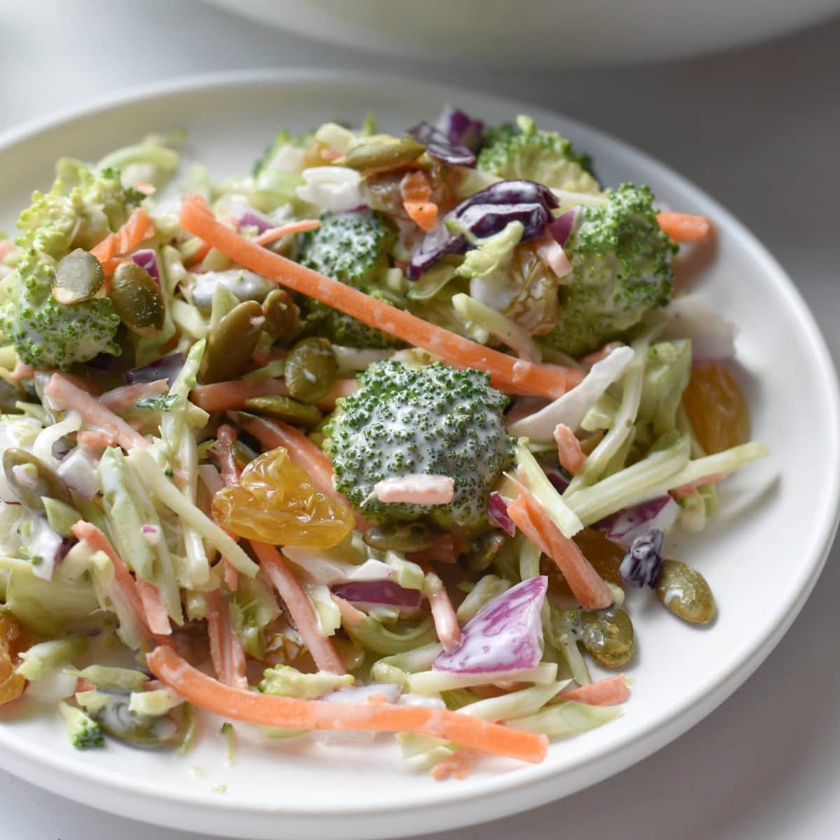 Broccoli Salad with Raisins that are golden.