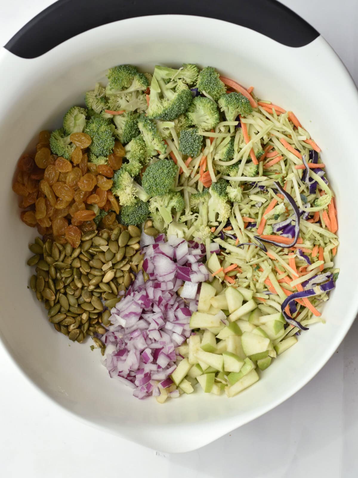Broccoli Salad with Raisin ingredients unmixed. 