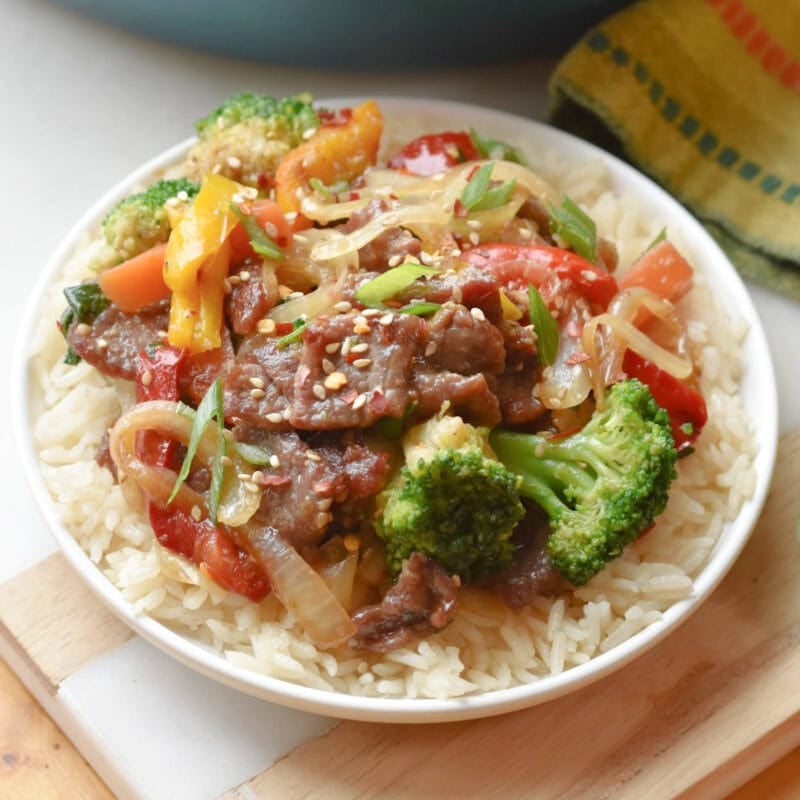 Thin sliced steak stir fry in a bowl.