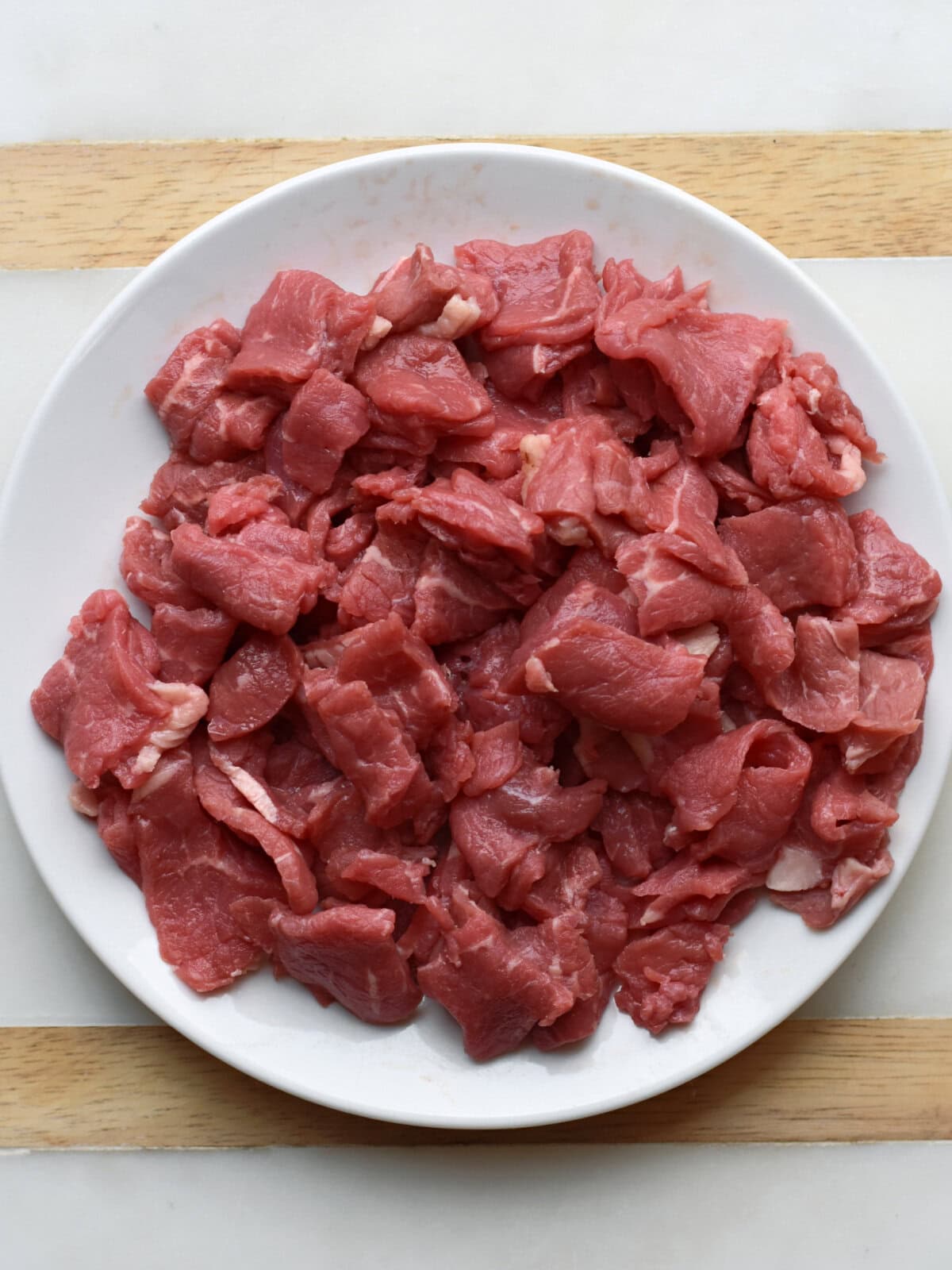 Thin sliced steak cut into 1 inch pieces. 
