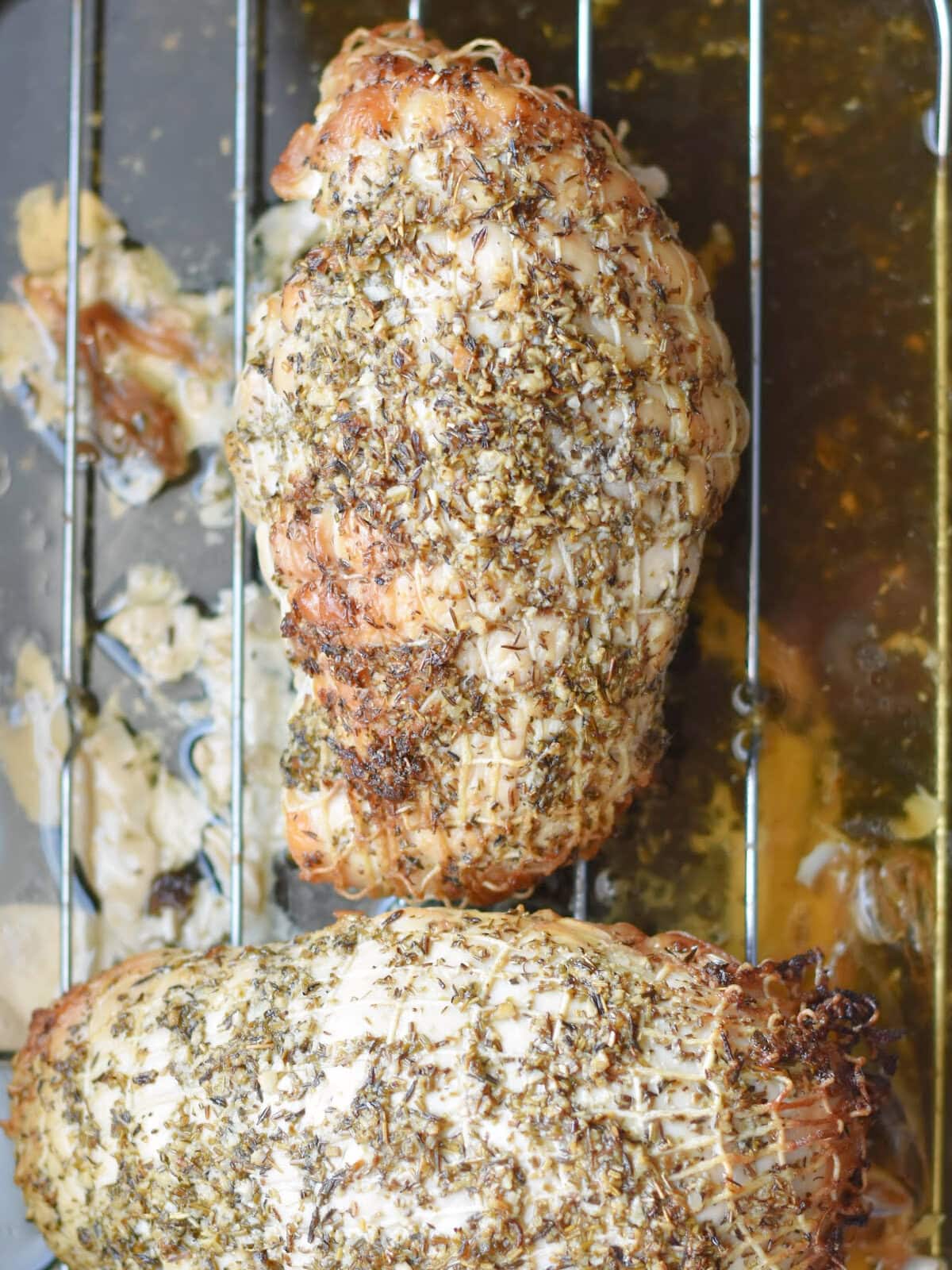 Golden brown turkey breast made in a roaster oven. 