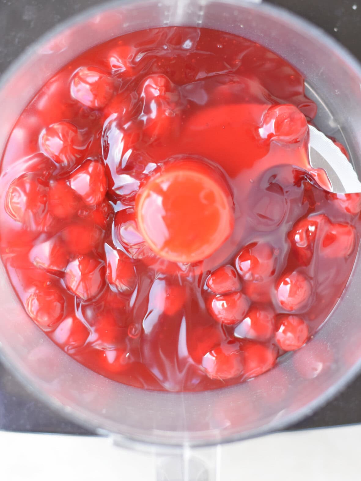 Cherry pie filling in a food processor.