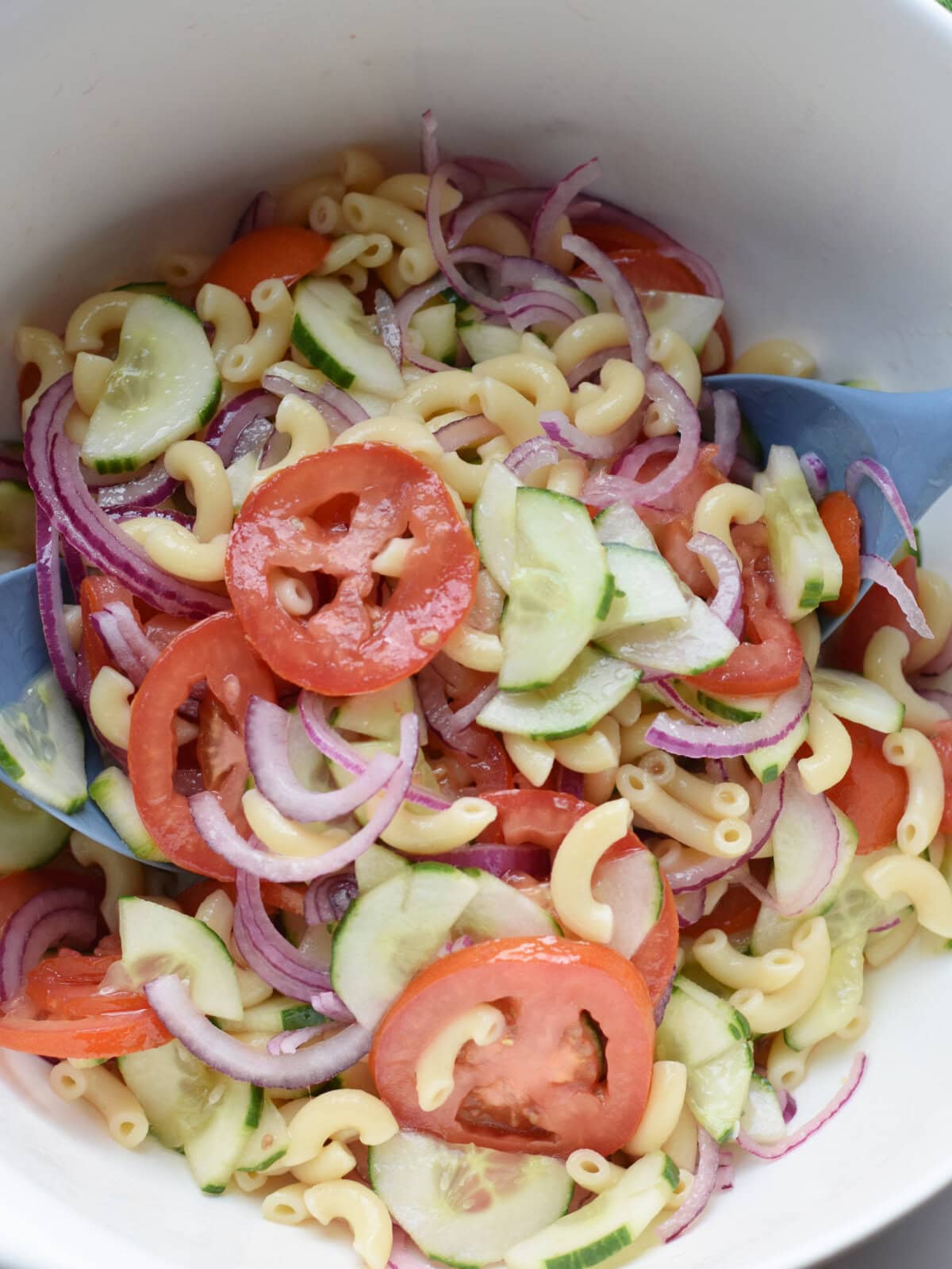 Tossed ingredients mixed in a bowl. 