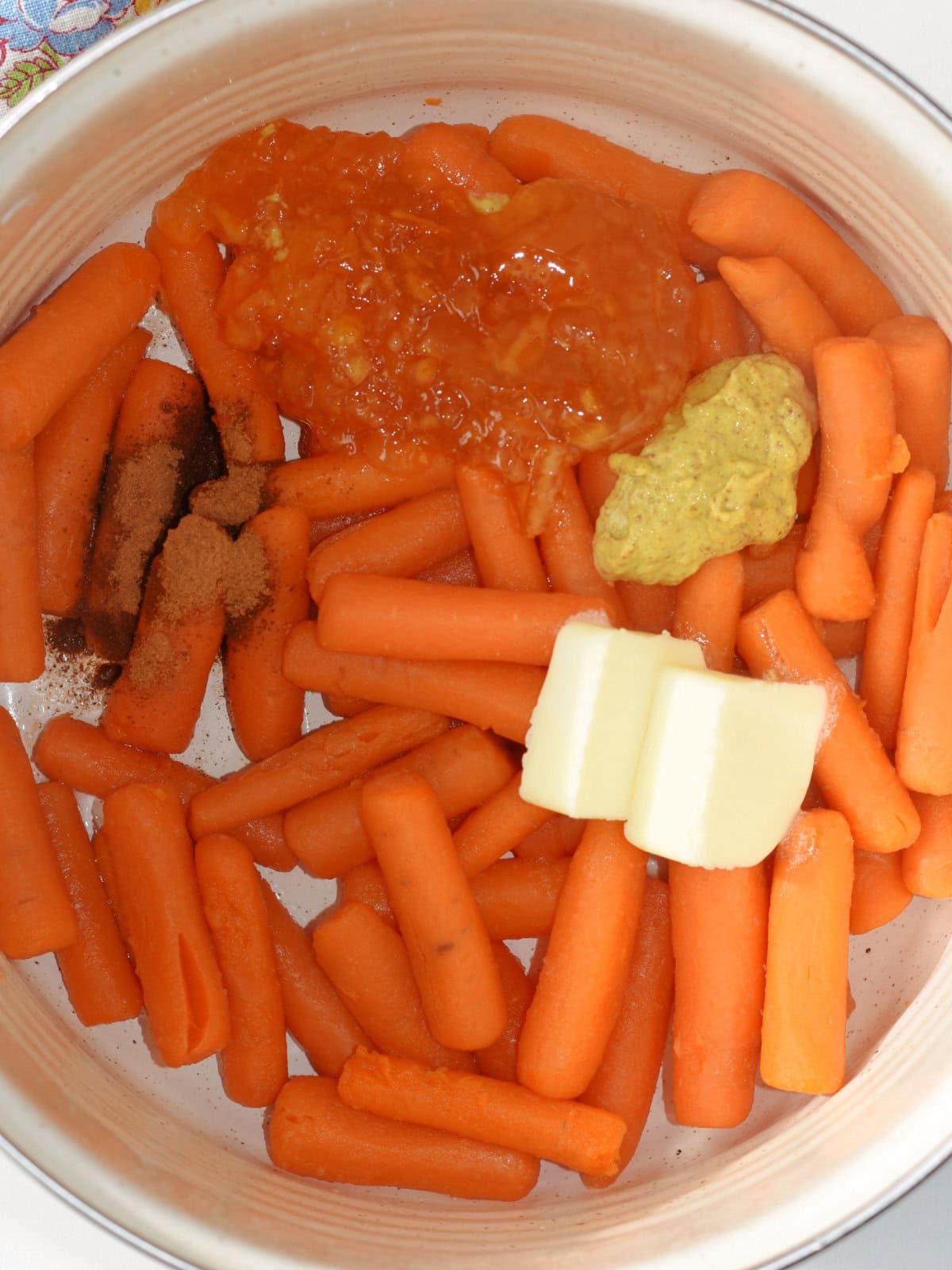 carrots-orange-marmalade-glazing Creating the glaze with marmalade, spicy brown mustard, sugar and butter.