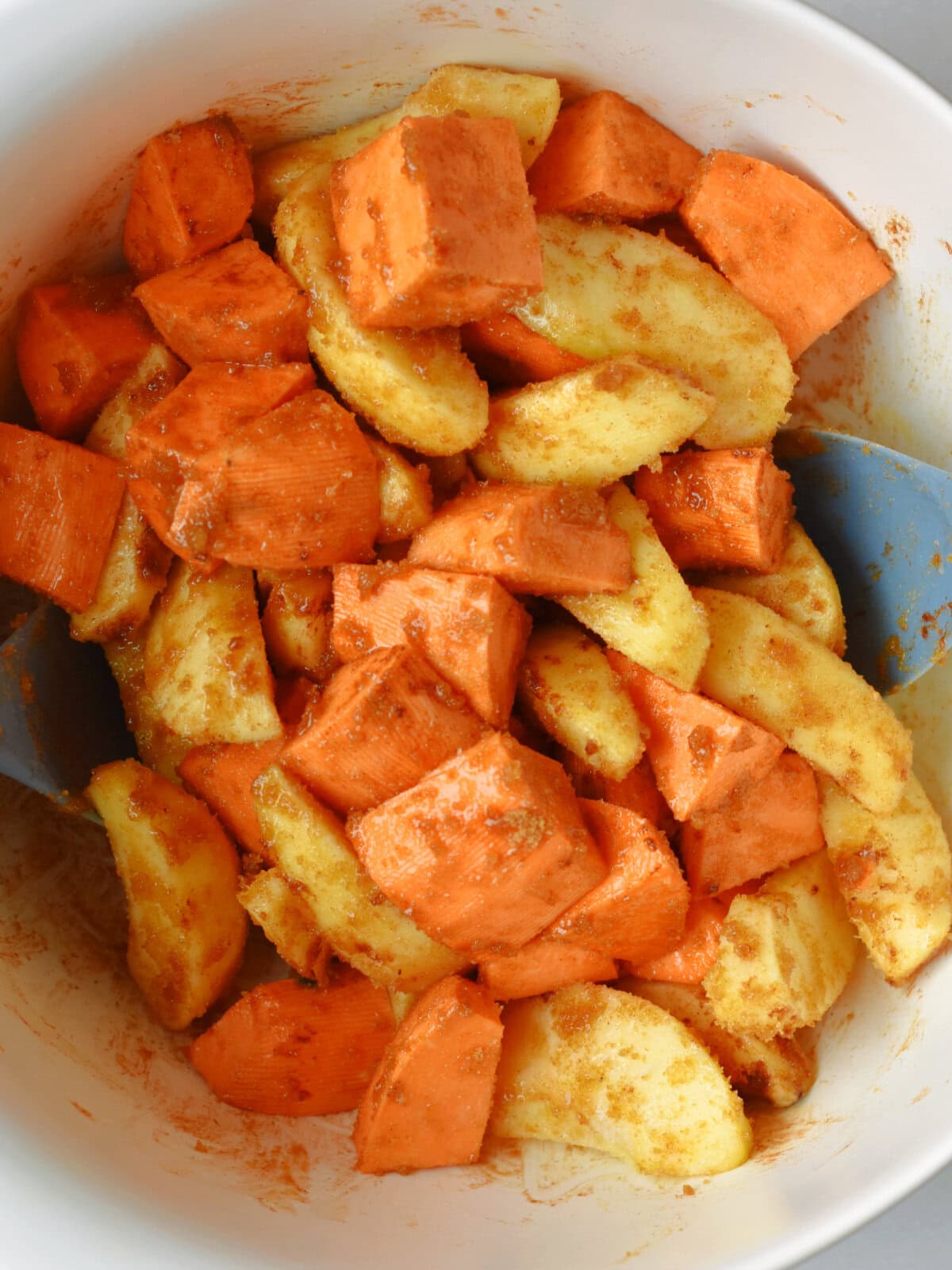Raw ingredients tossed in sugar and cinnamon. 