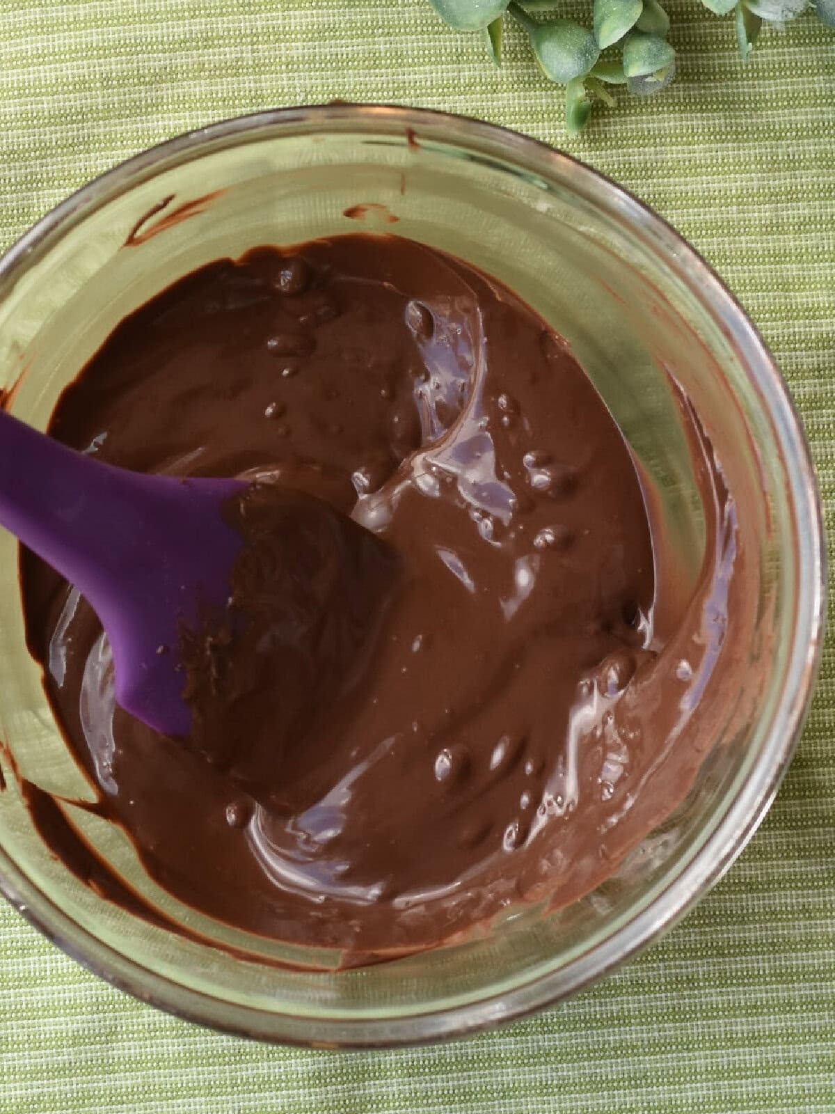 Melted chocolate morsels in a mixing bowl. 
