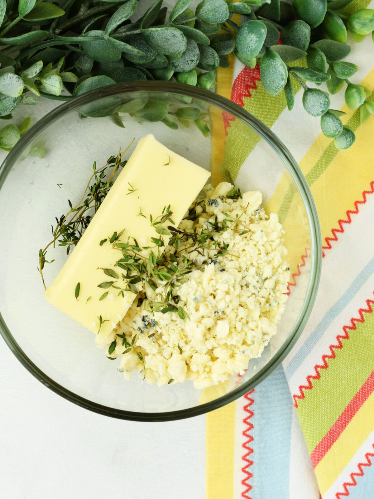 filet-mignon-oven-butter-mix Butter, bleu cheese and fresh herbs in a mixing bowl.