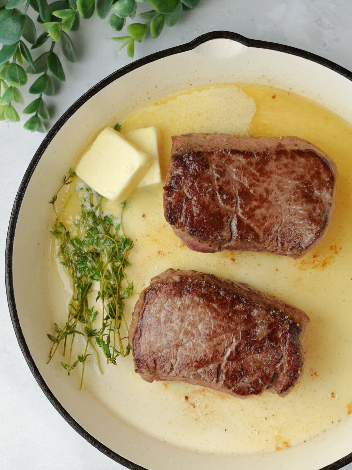 filet-mignon-oven-seared Seared filet mignon in a cast iron skillet.