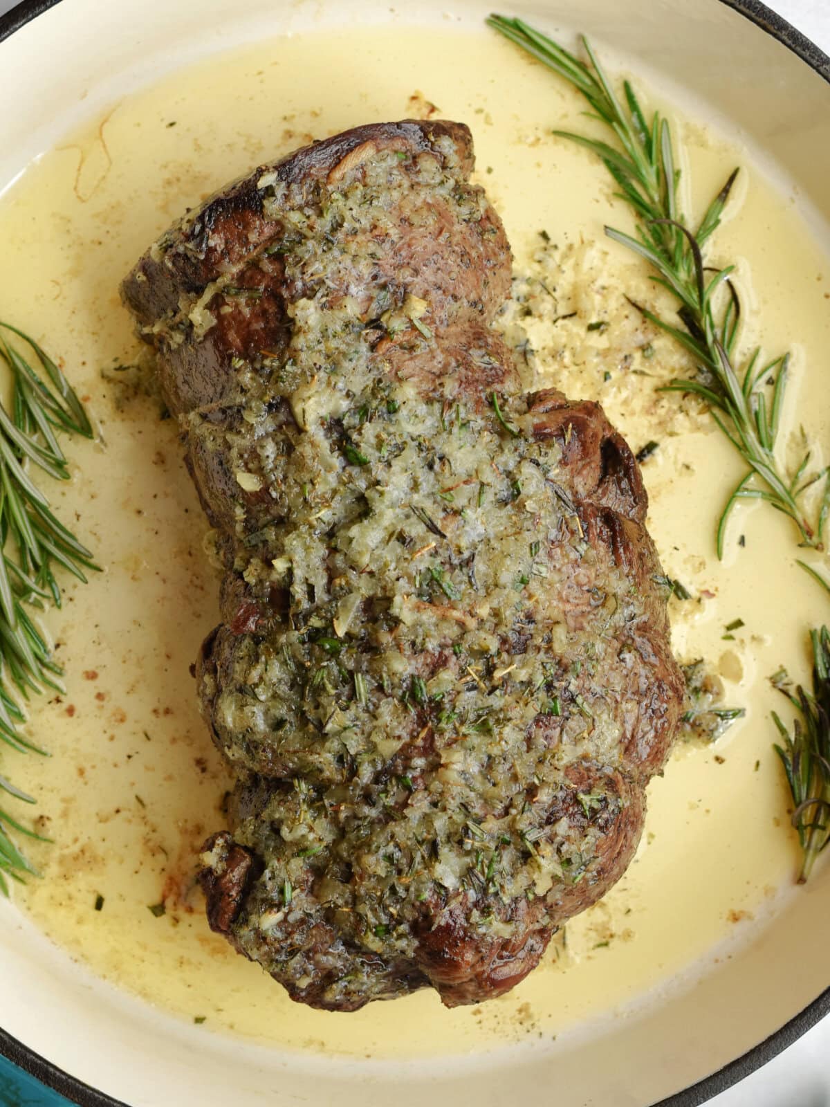 roasted-beef-tenderloin-cooked Roasted beef tenderloin fully roasted and resting in the roasting pan.