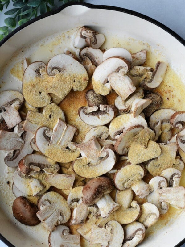 Mushrooms in a skillet with butter. 