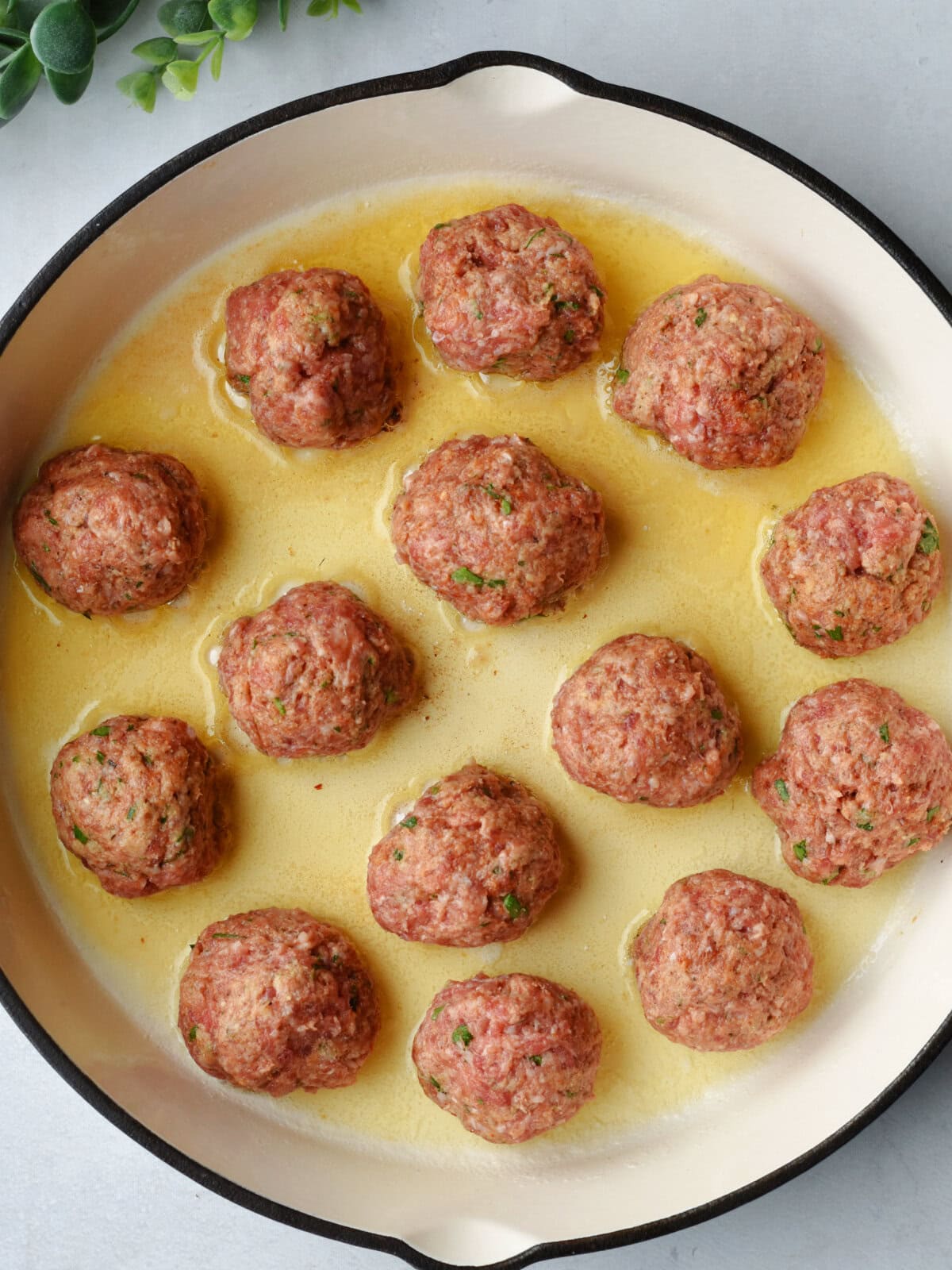Browning ground meat in a skillet. 