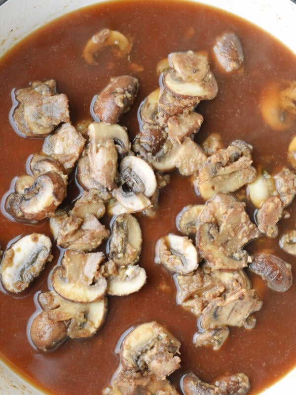 Mushrooms, beef broth, Worcestershire sauce in a skillet. 