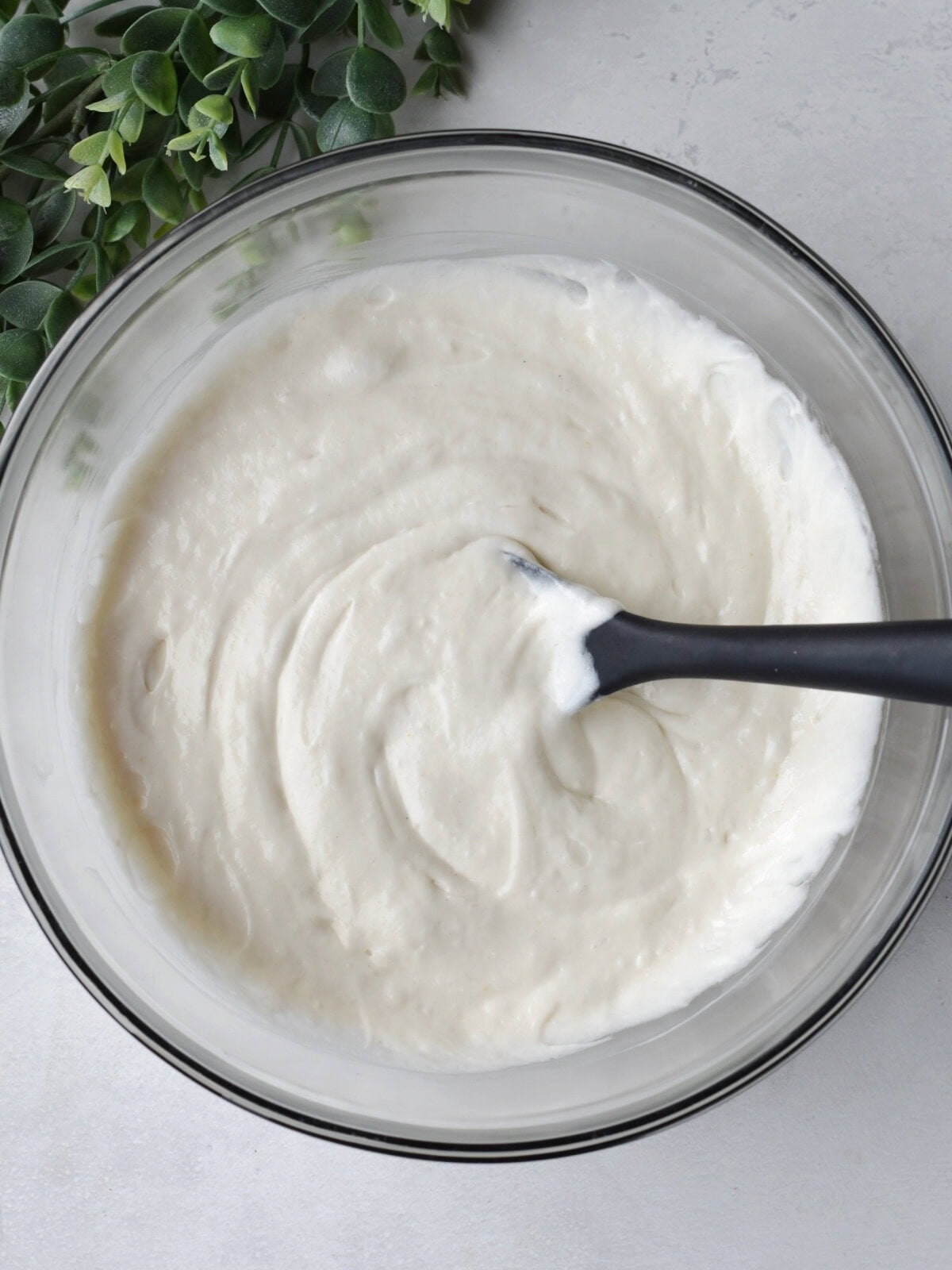 Cake batter in a mixing bowl. 