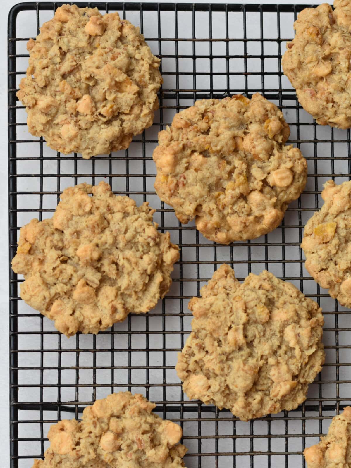 Cookies cooling and resting on a wire rack after baking. 