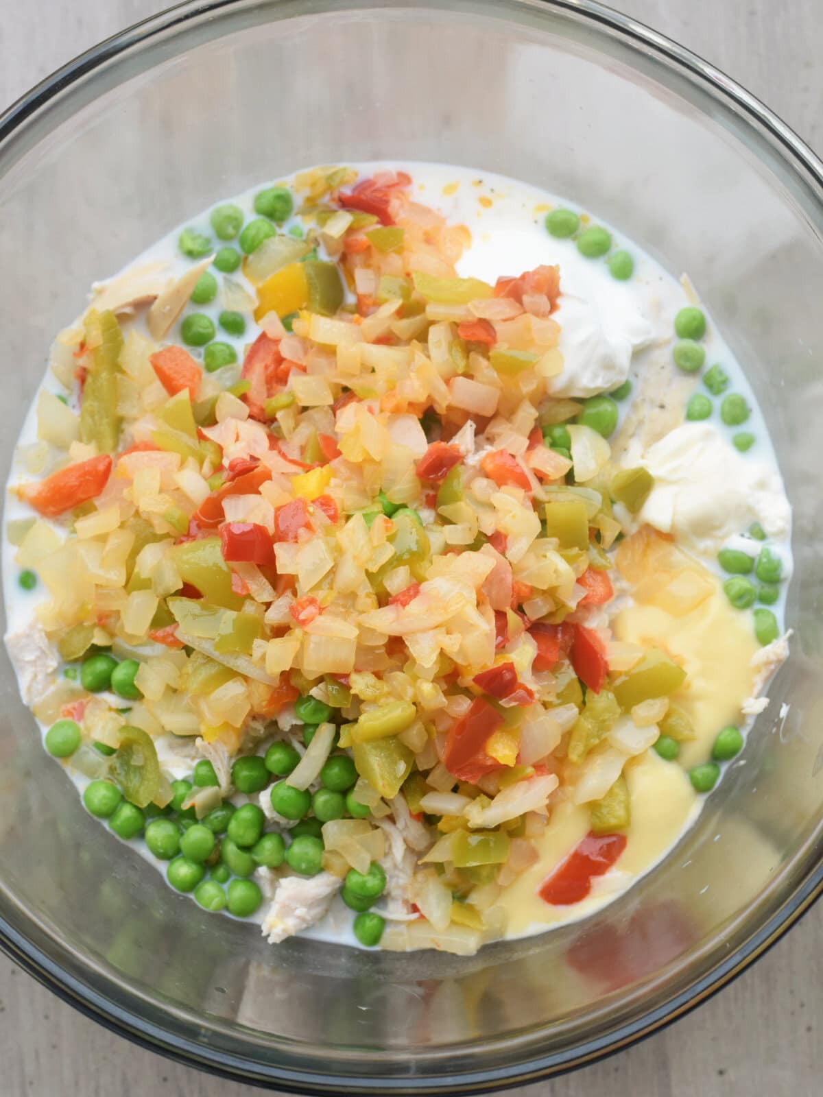 A mixing bowl with casserole filling. 