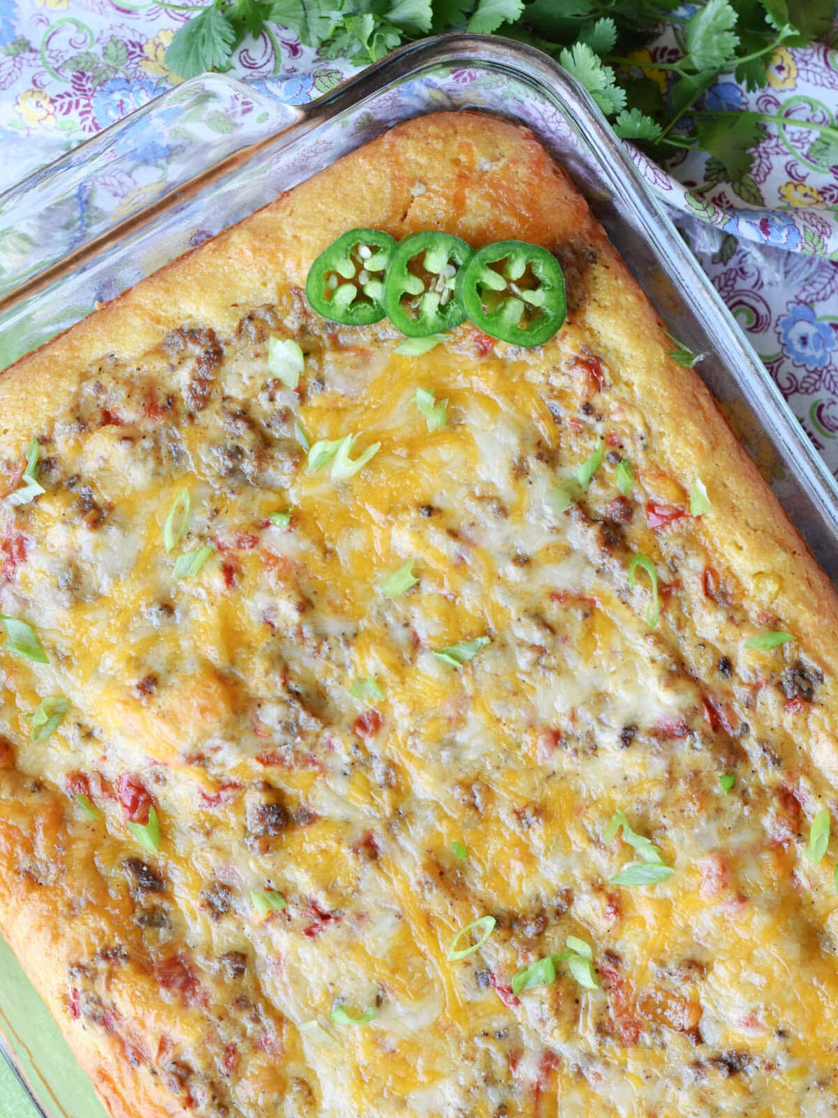 Fully cooked Cowboy Cornbread Casserole in a 9X13 pan, fresh from the oven. 