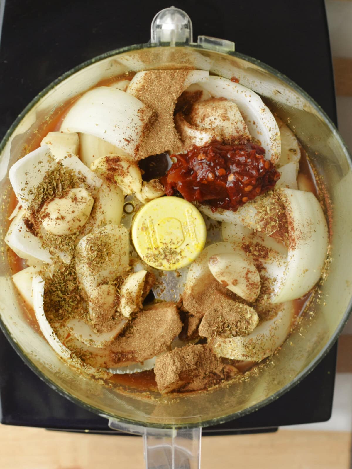 Food processor with marinade ingredients. 