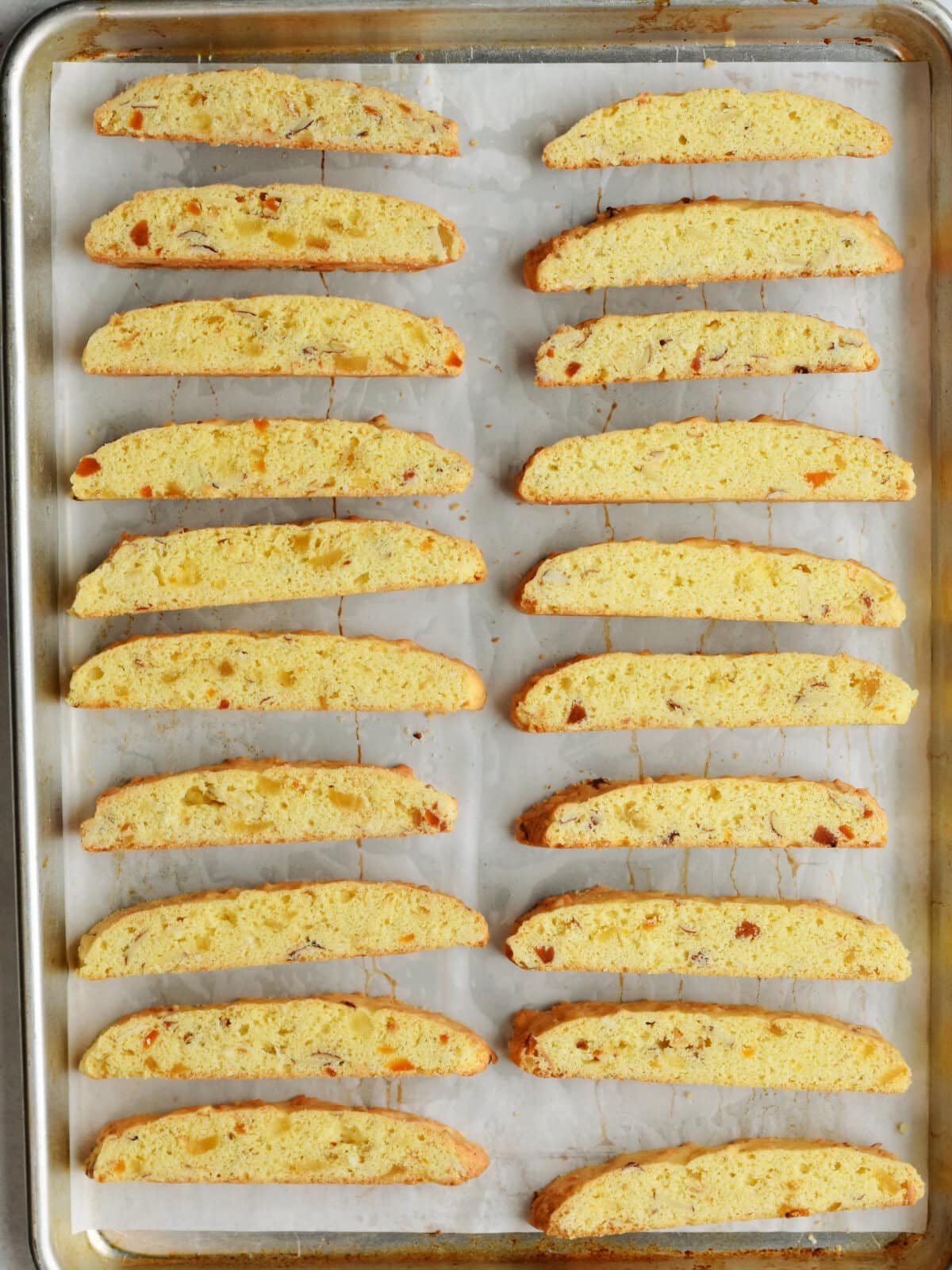 Sliced warm loaves on a baking sheet, cut side up. 