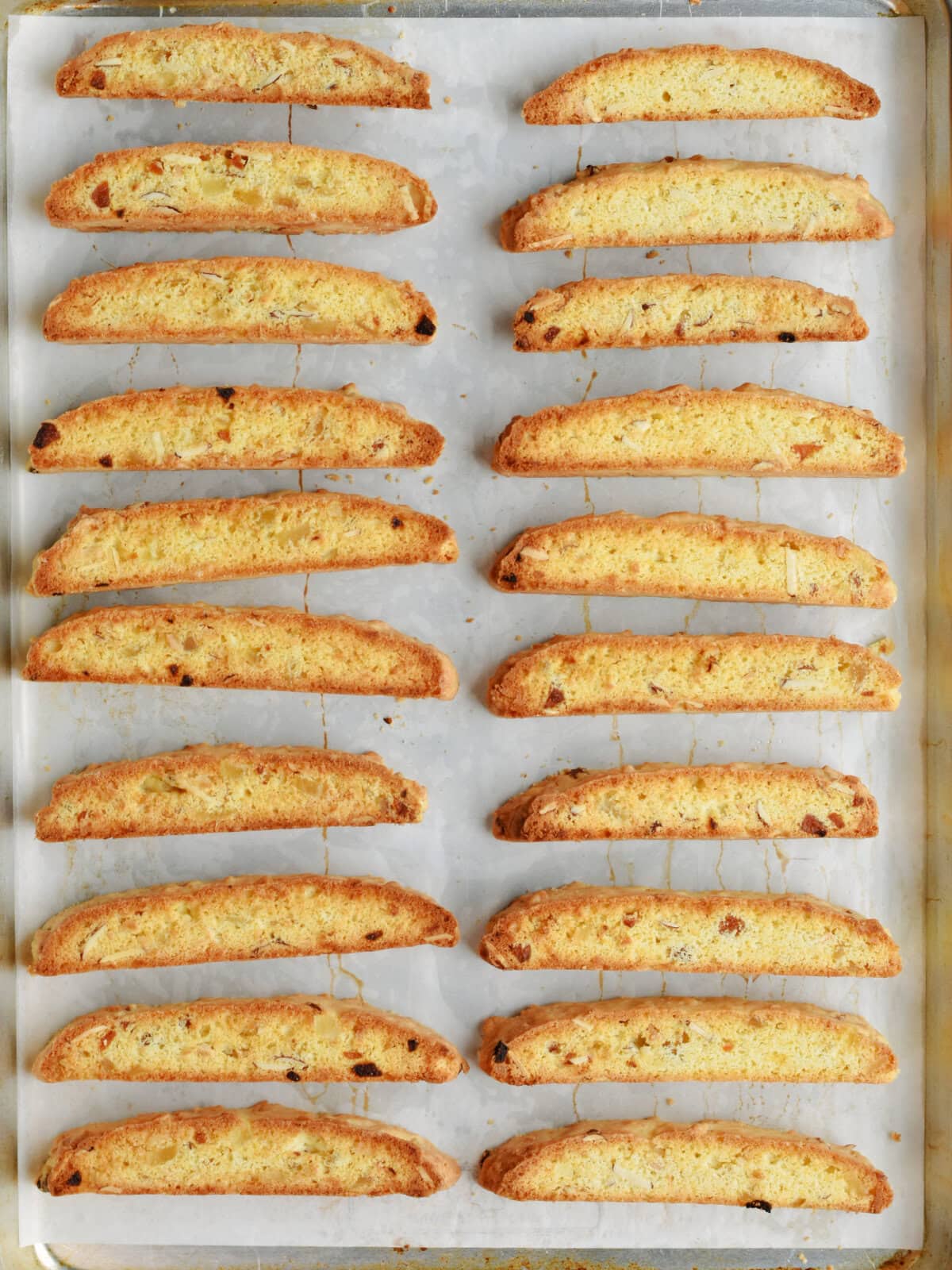 Fully baked sliced loaves ready to place on a cooling rack. 