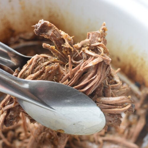 Shredded and pulled beef bottom round roast.