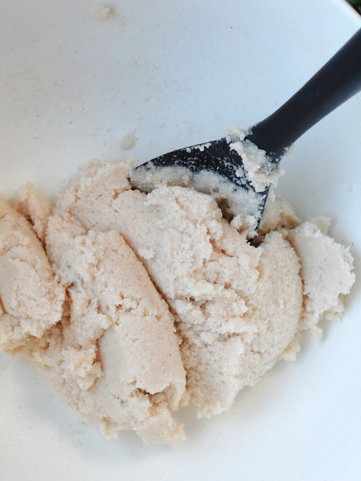 Batter in a white mixing bowl. 