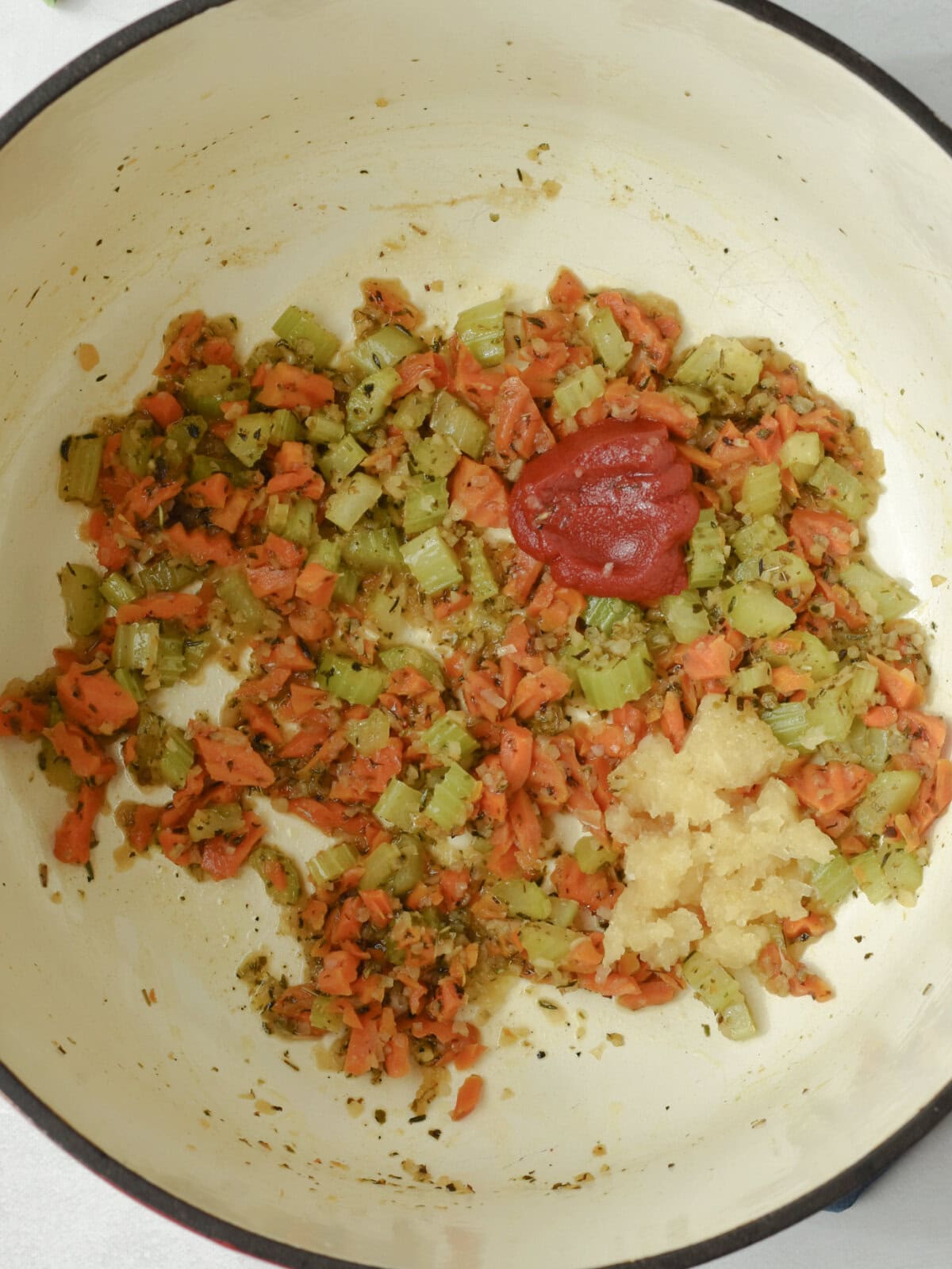 Caramelized vegetables cooking on medium heat. 